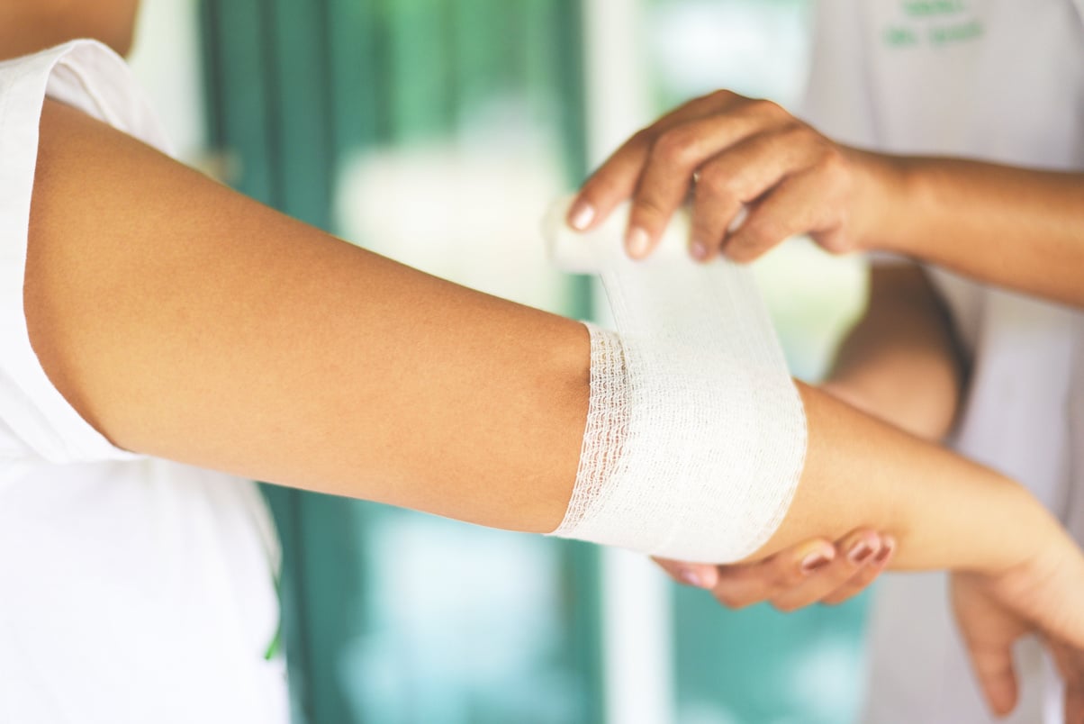 Elbow Wound Bandaging Arm by Nurse - First Aid Wrist Injury Heal